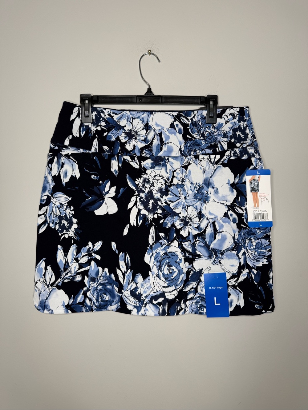 S.C. & Co. navy floral skort features tummy control